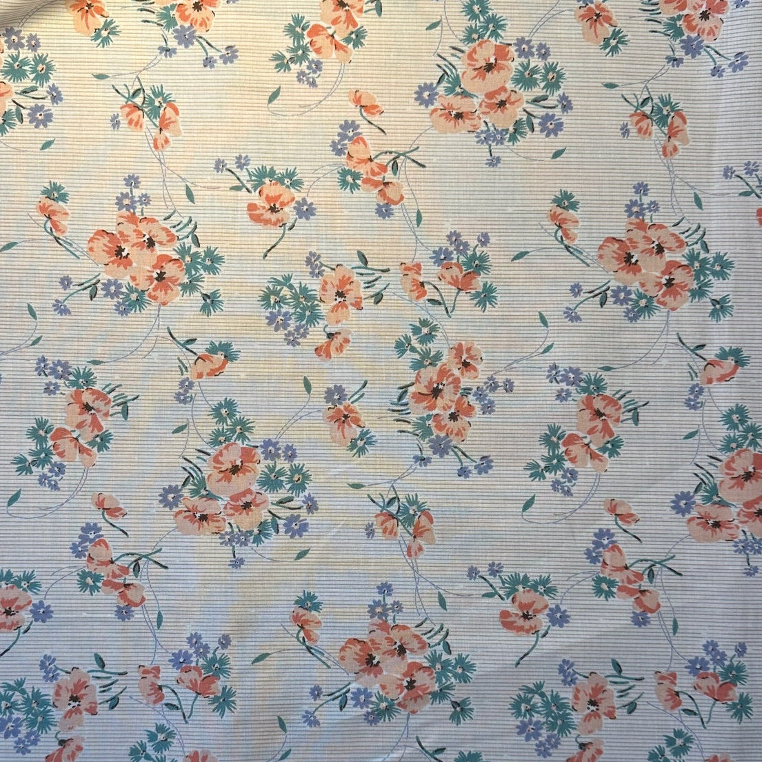 Patchworkstof med blomster