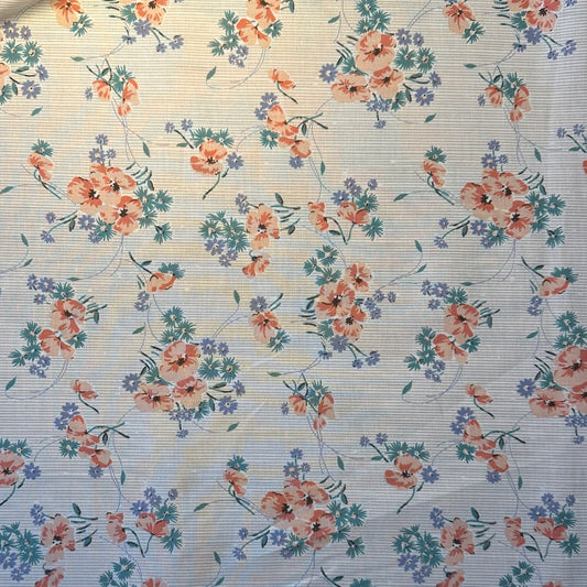 Patchworkstof med blomster